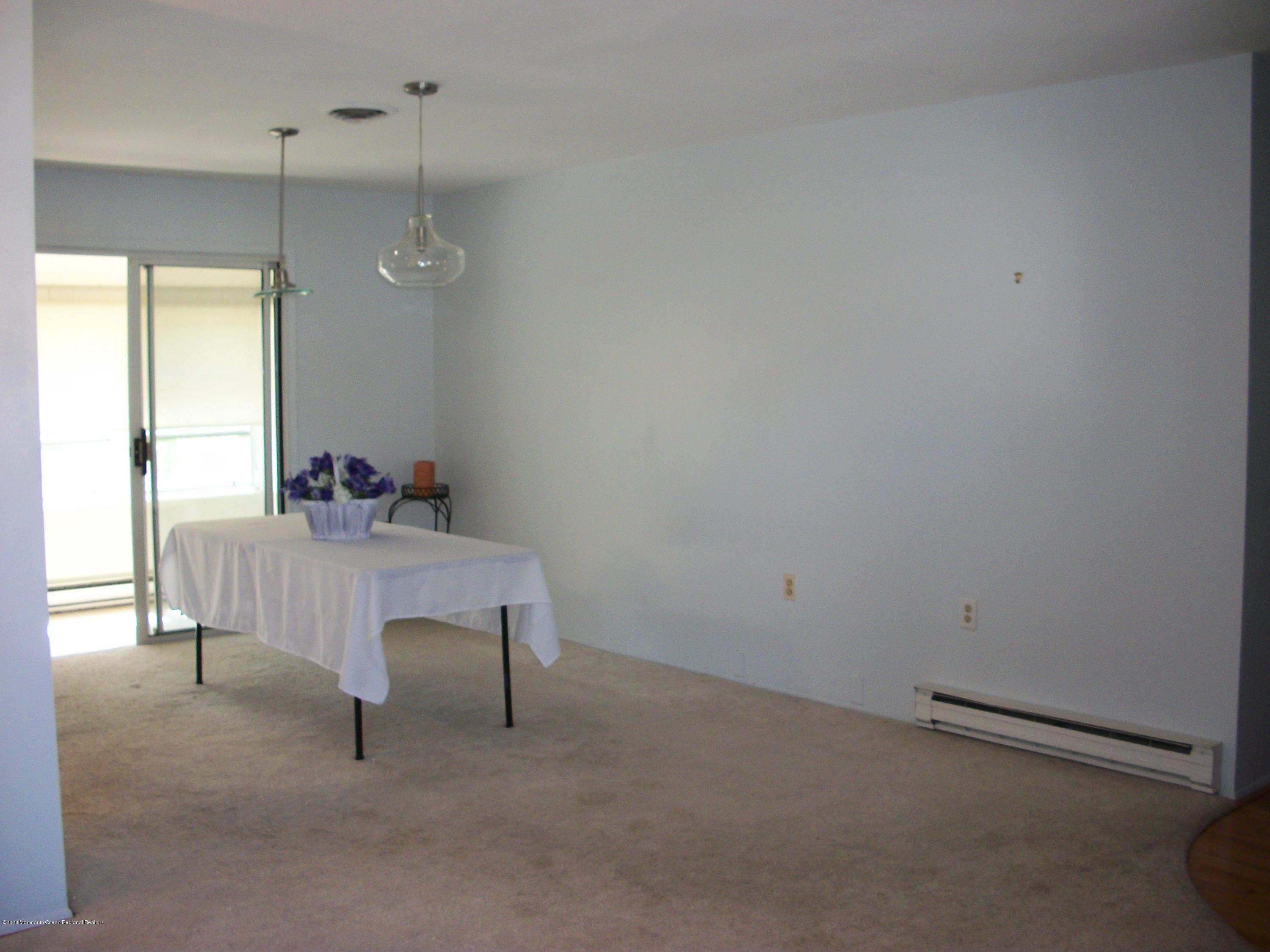 4 Alpine Road Whiting, NJ 08759 - Photo 21 of 37 a room with a table and windows