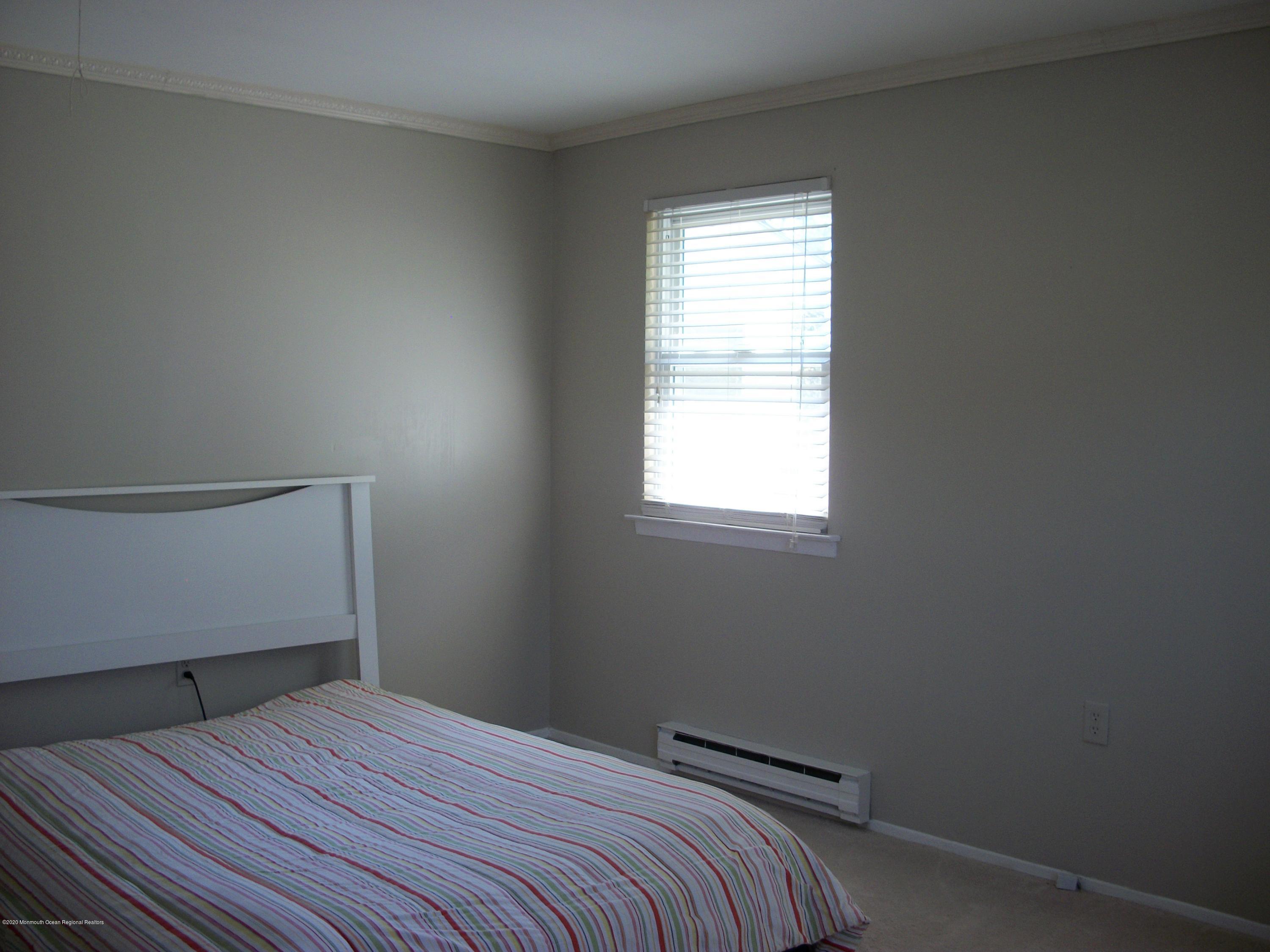 4 Alpine Road Whiting, NJ 08759 - Photo 26 of 37 a bedroom with a bed and a window