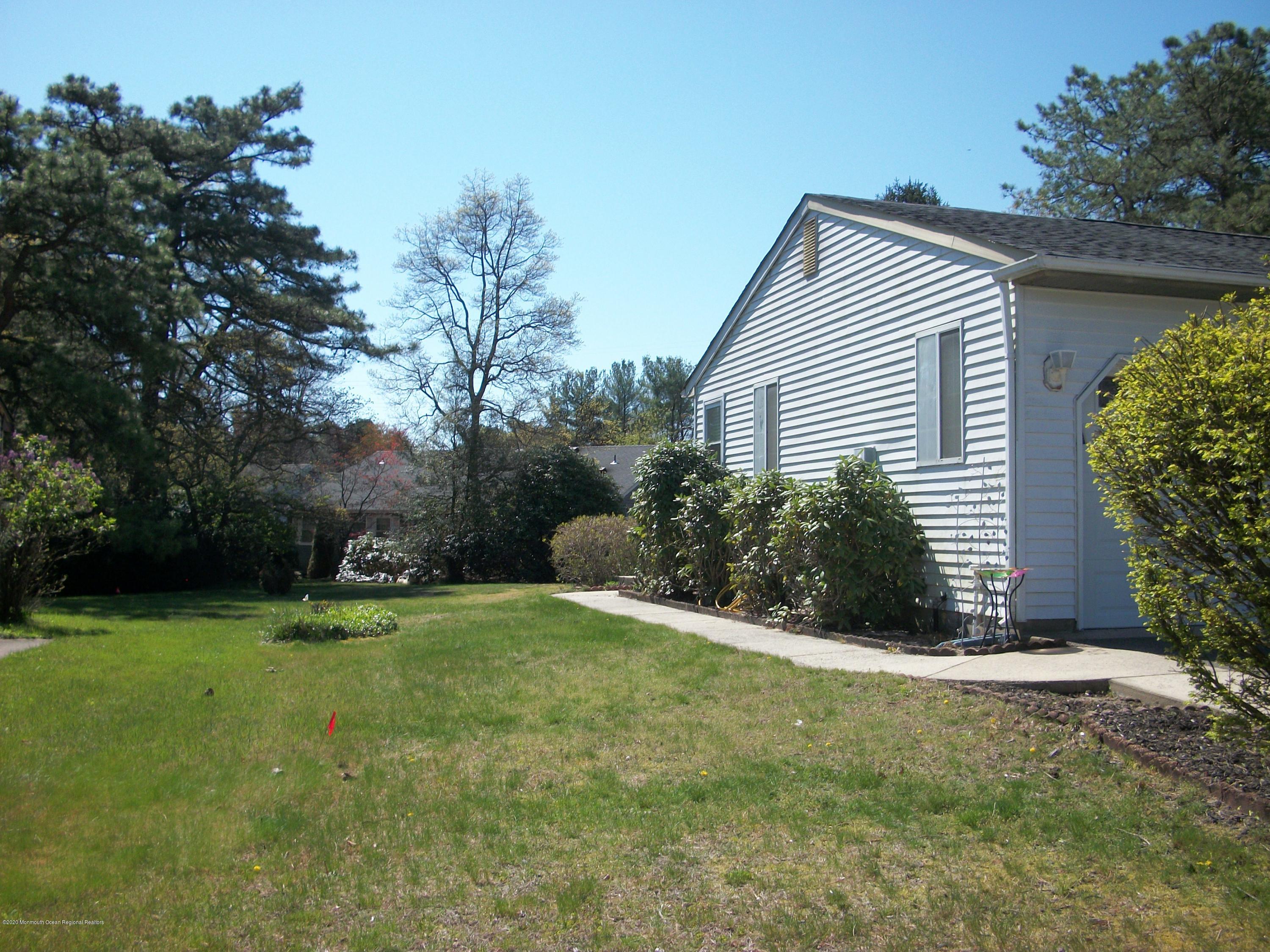 4 Alpine Road Whiting, NJ 08759 - Photo 32 of 37 a view of a house with a yard and sitting area