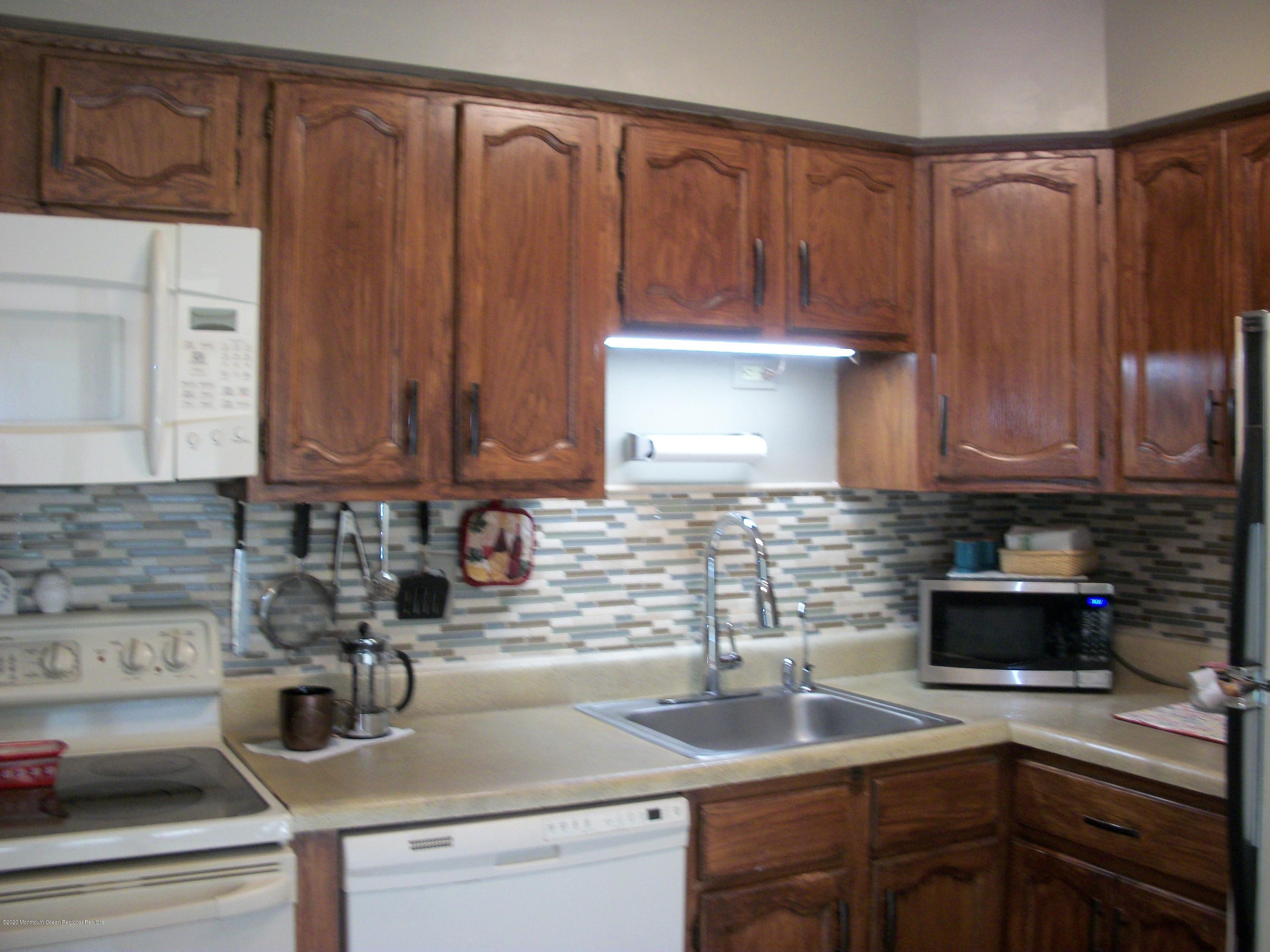 4 Alpine Road Whiting, NJ 08759 - Photo 10 of 37 a kitchen with a sink and cabinets
