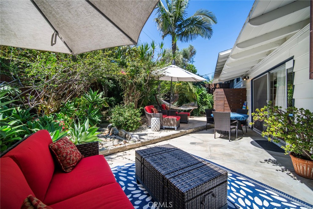 33915 Robles Drive, Unit A Dana Point, CA 92629 - Photo 19 of 37 a view of a backyard with sitting area