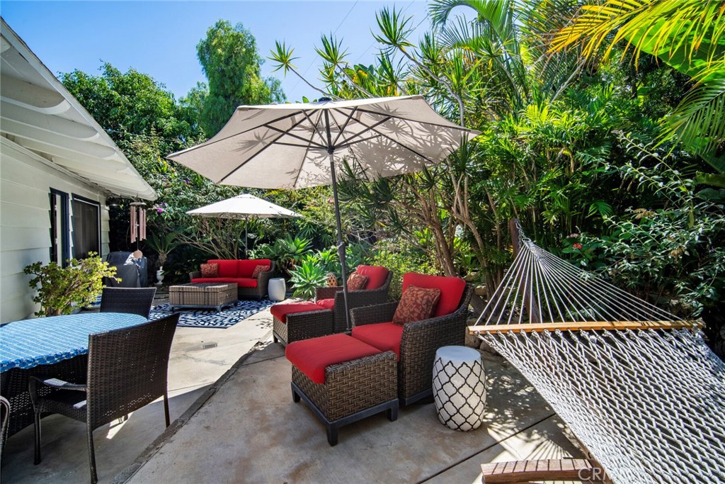 33915 Robles Drive, Unit A Dana Point, CA 92629 - Photo 21 of 37 a view of backyard with outdoor seating and trees