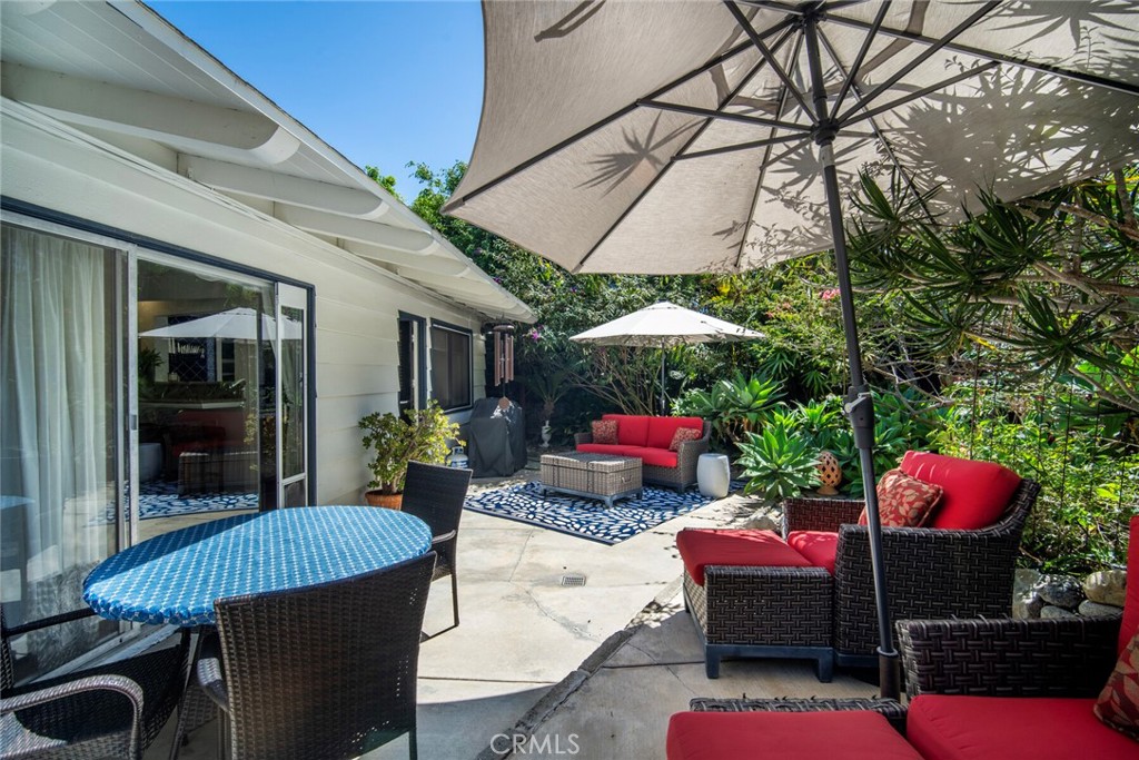 33915 Robles Drive, Unit A Dana Point, CA 92629 - Photo 22 of 37 a building outdoor space with patio furniture