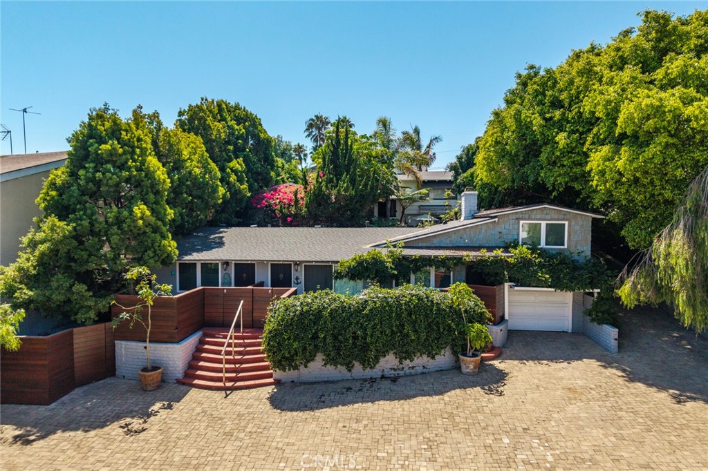 33915 Robles Drive, Unit A Dana Point, CA 92629 - Photo 25 of 37 a front view of a house with a yard