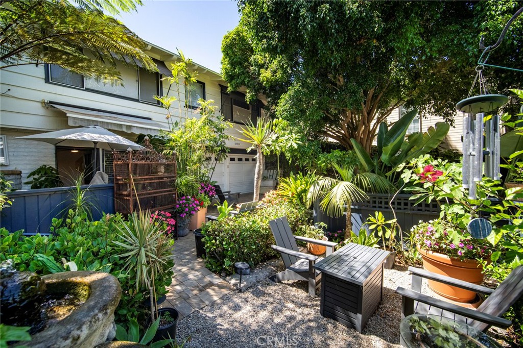 33915 Robles Drive, Unit A Dana Point, CA 92629 - Photo 35 of 37 a view of a chair and tables in the patio