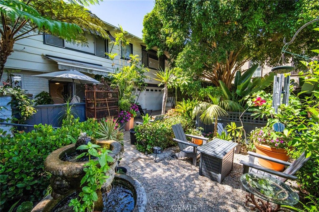 33915 Robles Drive, Unit A Dana Point, CA 92629 - Photo 37 of 37 a backyard of a house with lots of green space