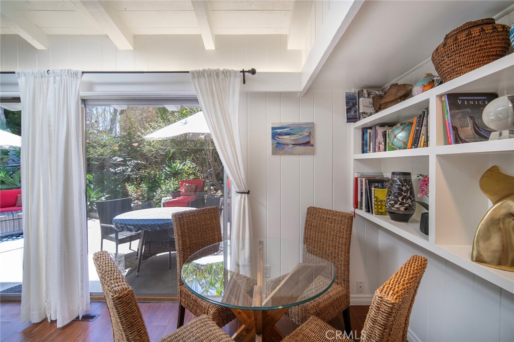 33915 Robles Drive, Unit A Dana Point, CA 92629 - Photo 8 of 37 a view of a dining room with furniture window and wooden floor