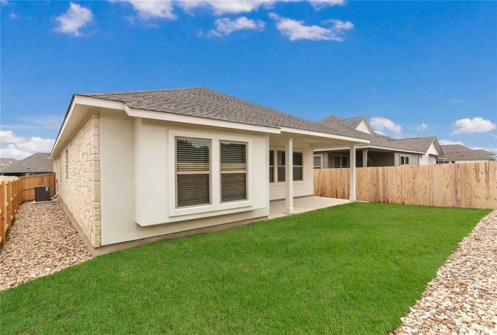 2233 Ringstaff Road Leander, TX 78641 - Photo 12 of 18 a front view of a house with a garden