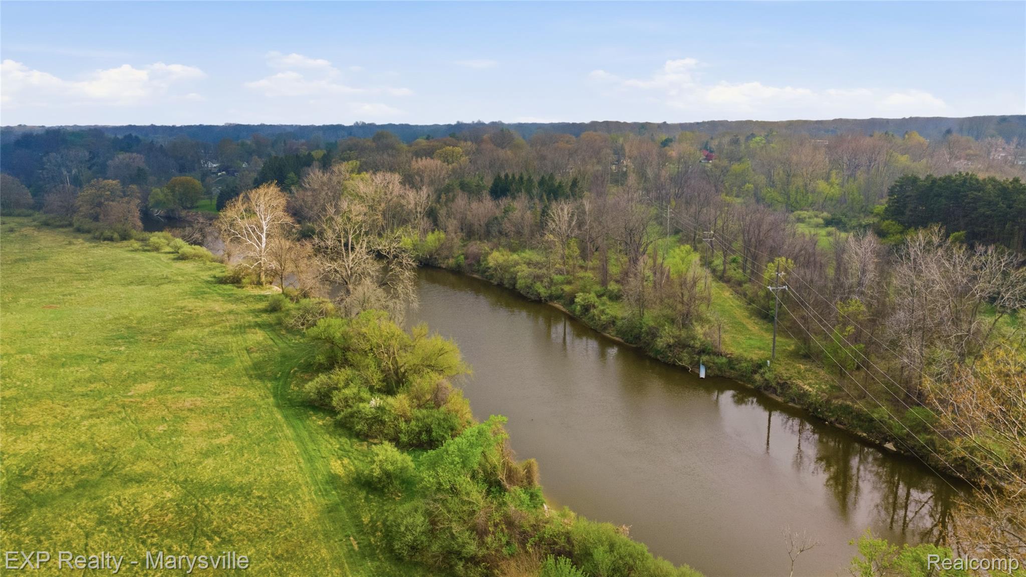 3345 Beach Road Port Huron, MI 48060 - Photo 78 of 89 Drone / aerial view of a nearby body of water and a heavily wooded area