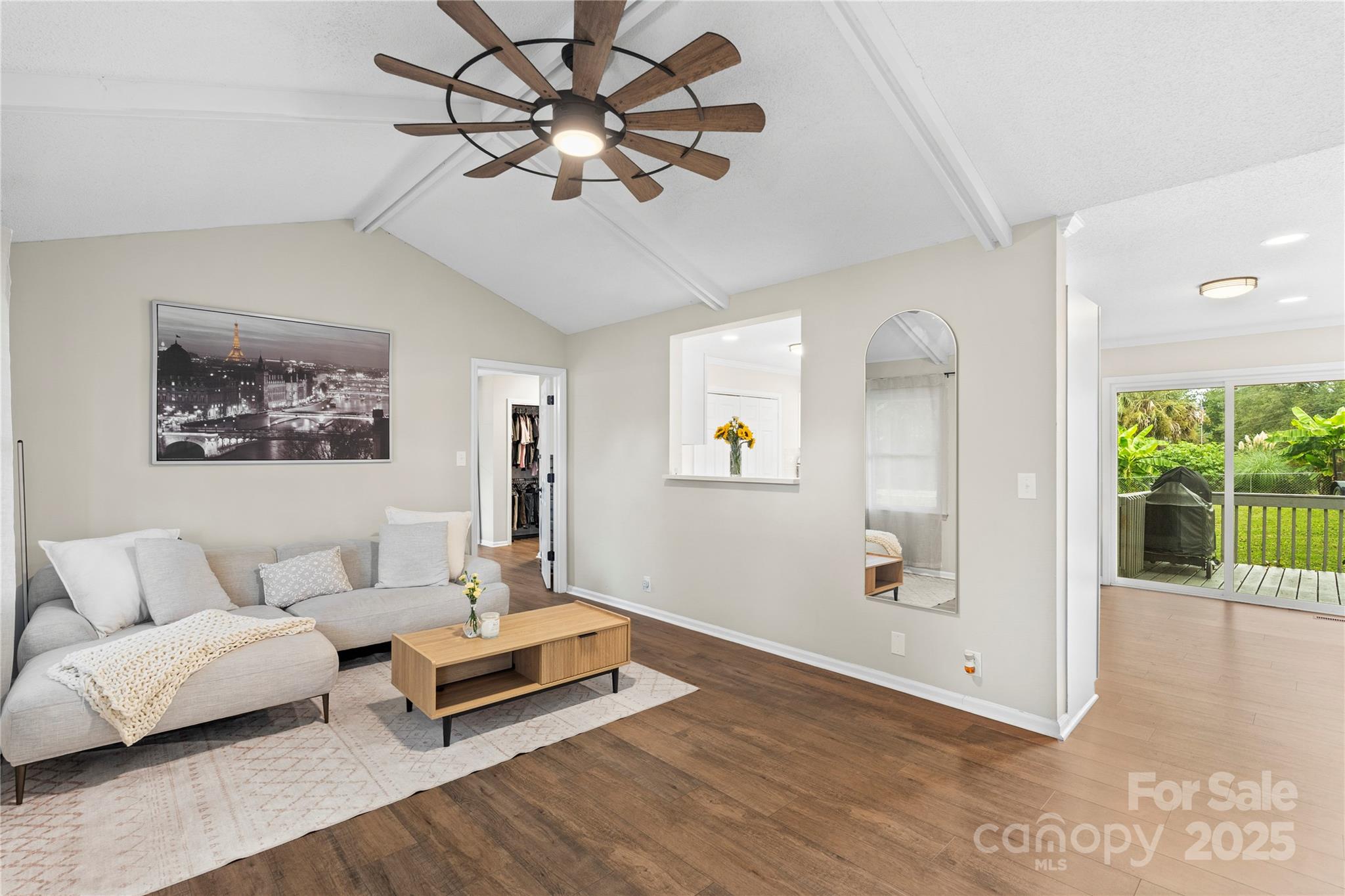 2302 Old Hickory Grove Road Mount Holly, NC 28120 - Photo 11 of 48 a living room with furniture and a wooden floor