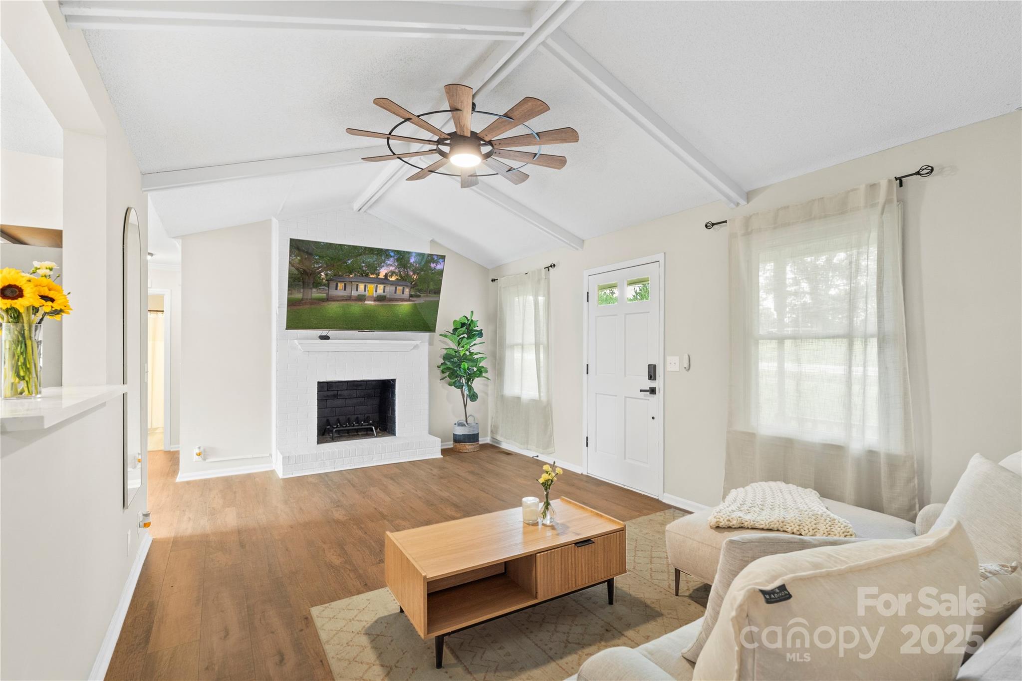 2302 Old Hickory Grove Road Mount Holly, NC 28120 - Photo 12 of 48 a bedroom with a bed and a fireplace