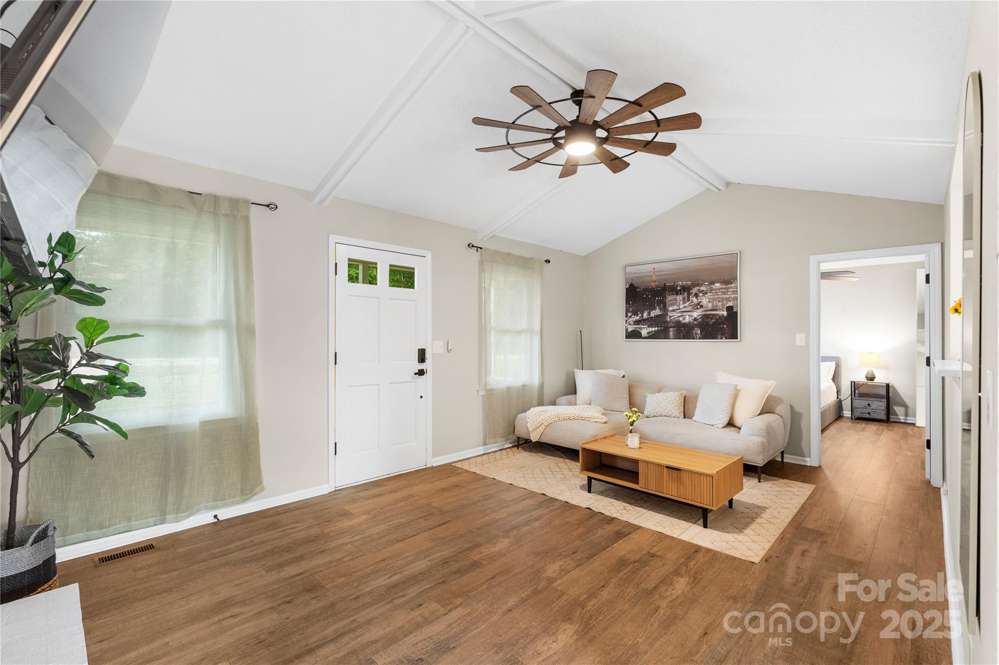 2302 Old Hickory Grove Road Mount Holly, NC 28120 - Photo 13 of 48 a living room with furniture and a potted plant