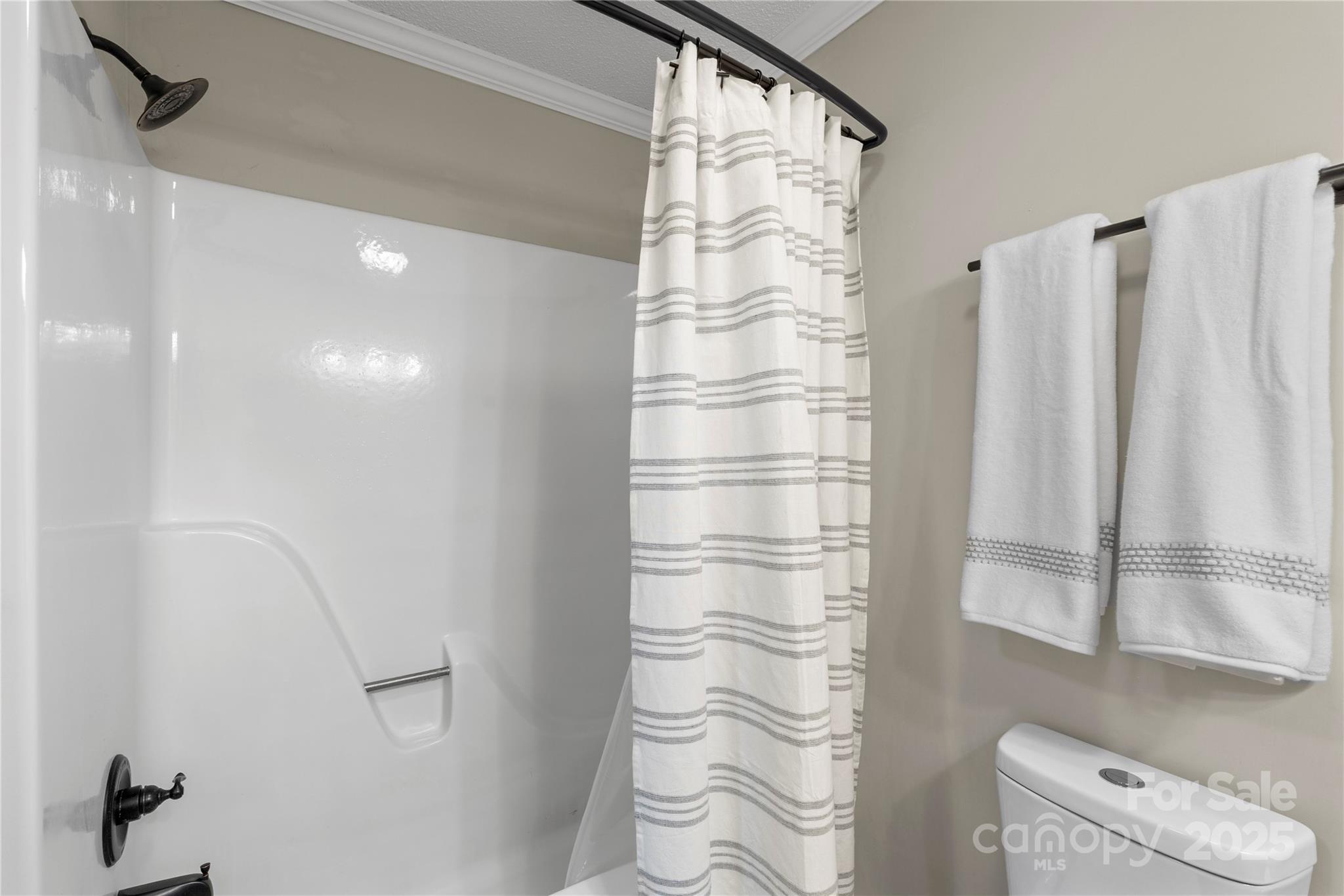 2302 Old Hickory Grove Road Mount Holly, NC 28120 - Photo 28 of 48 a bathroom with a shower and a toilet