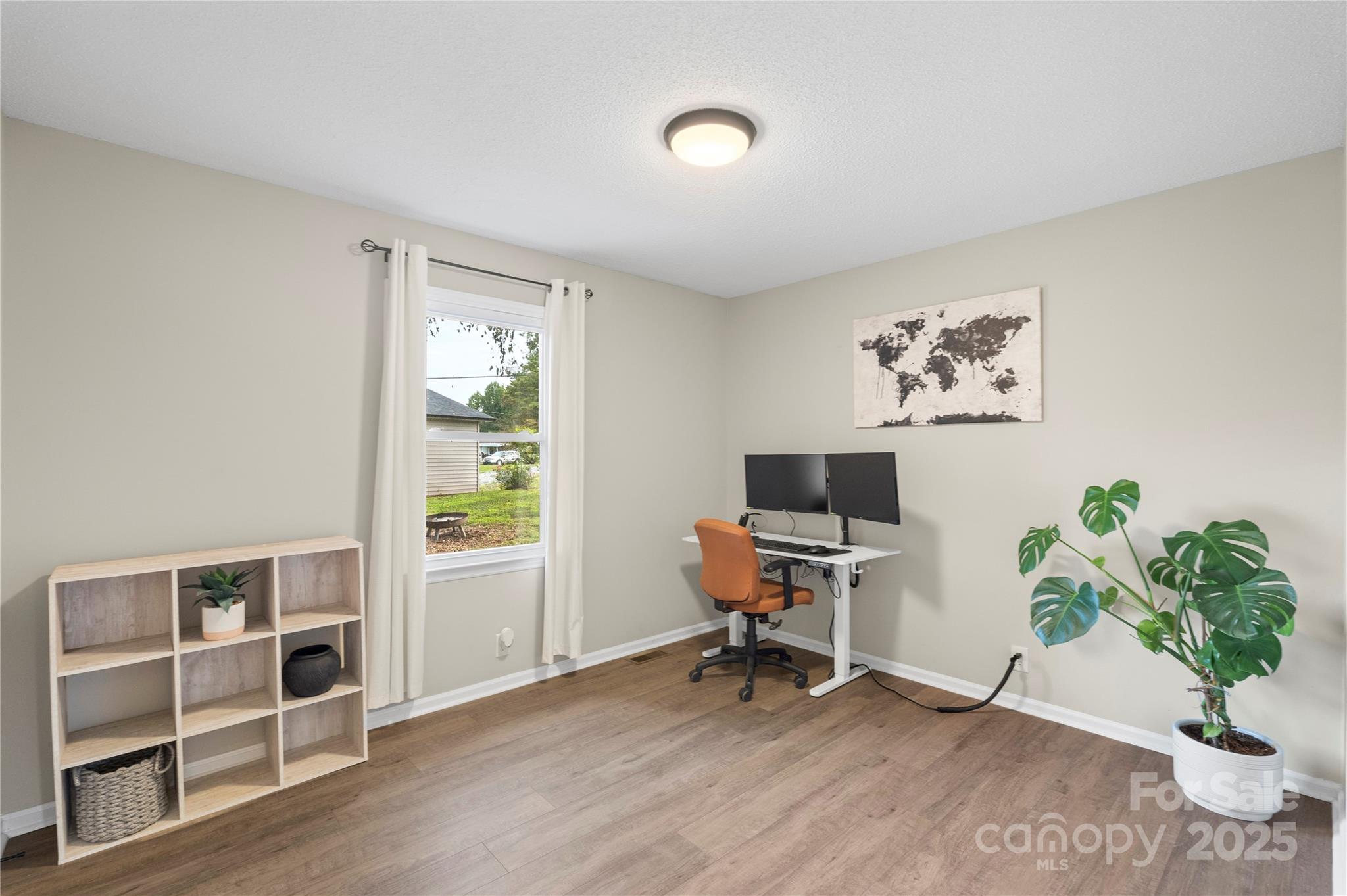 2302 Old Hickory Grove Road Mount Holly, NC 28120 - Photo 29 of 48 a view of a workspace with furniture and a window