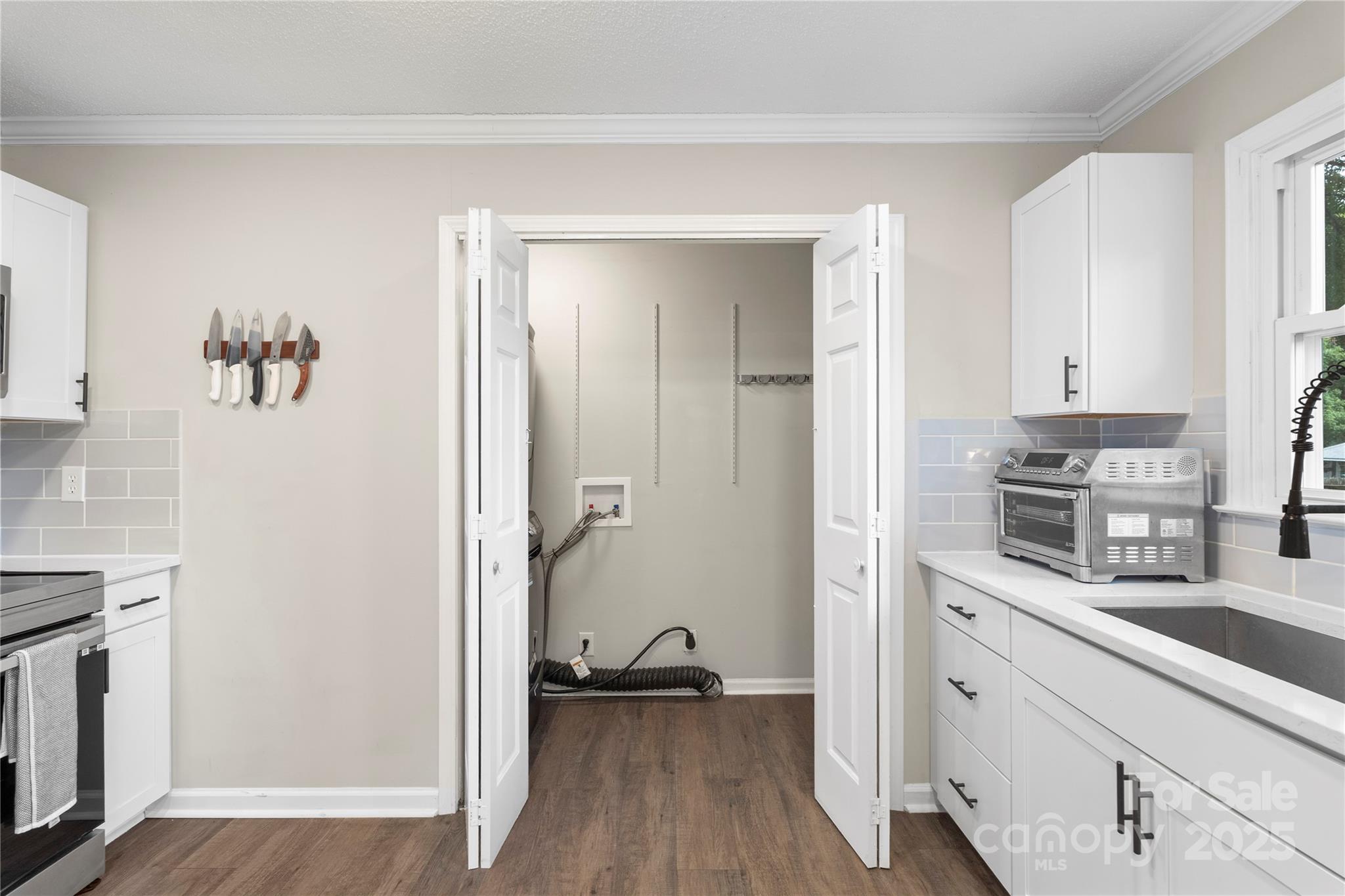 2302 Old Hickory Grove Road Mount Holly, NC 28120 - Photo 35 of 48 a kitchen with a refrigerator and cabinets