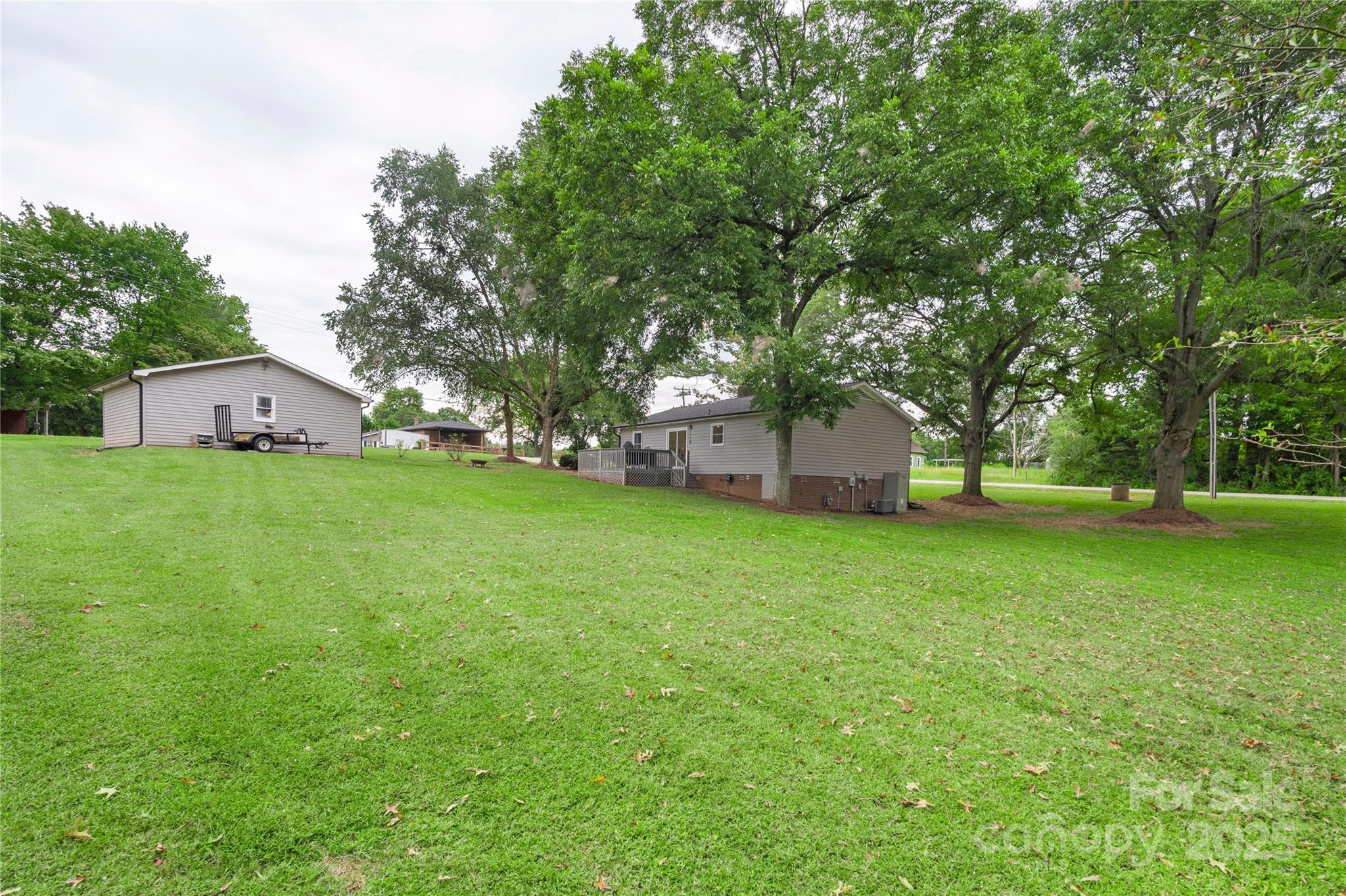 2302 Old Hickory Grove Road Mount Holly, NC 28120 - Photo 42 of 48 a view of a house with backyard and garden