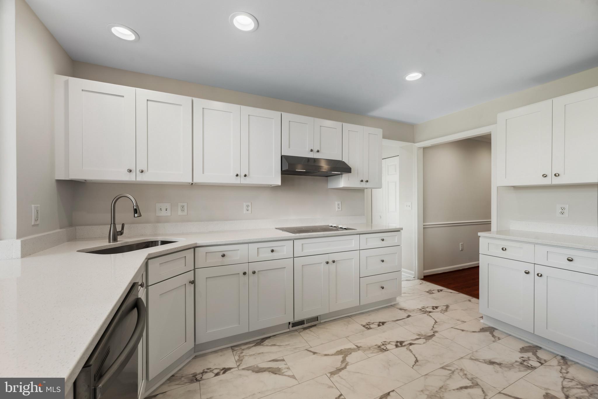 5929 Deale Beach Road Deale, MD 20751 - Photo 12 of 58 Kitchen with light marble finish floors, white cab