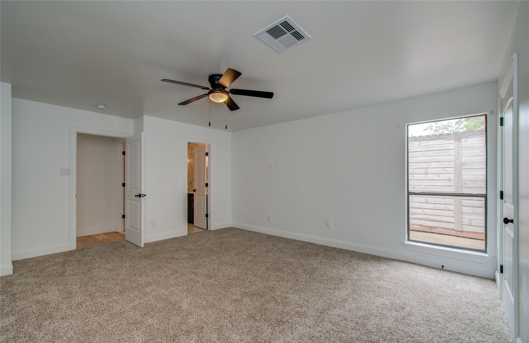 10300 Mayfield Road Houston, TX 77043 - Photo 12 of 32 a view of empty room with ceiling fan