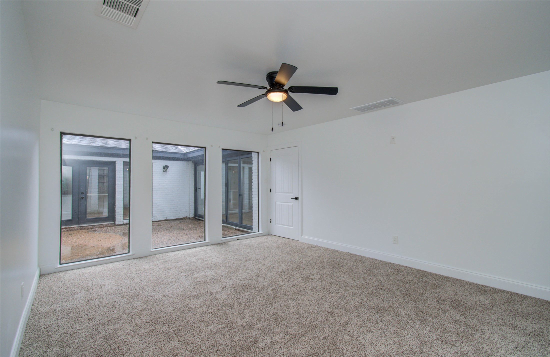 10300 Mayfield Road Houston, TX 77043 - Photo 22 of 32 a view of empty room with ceiling fan