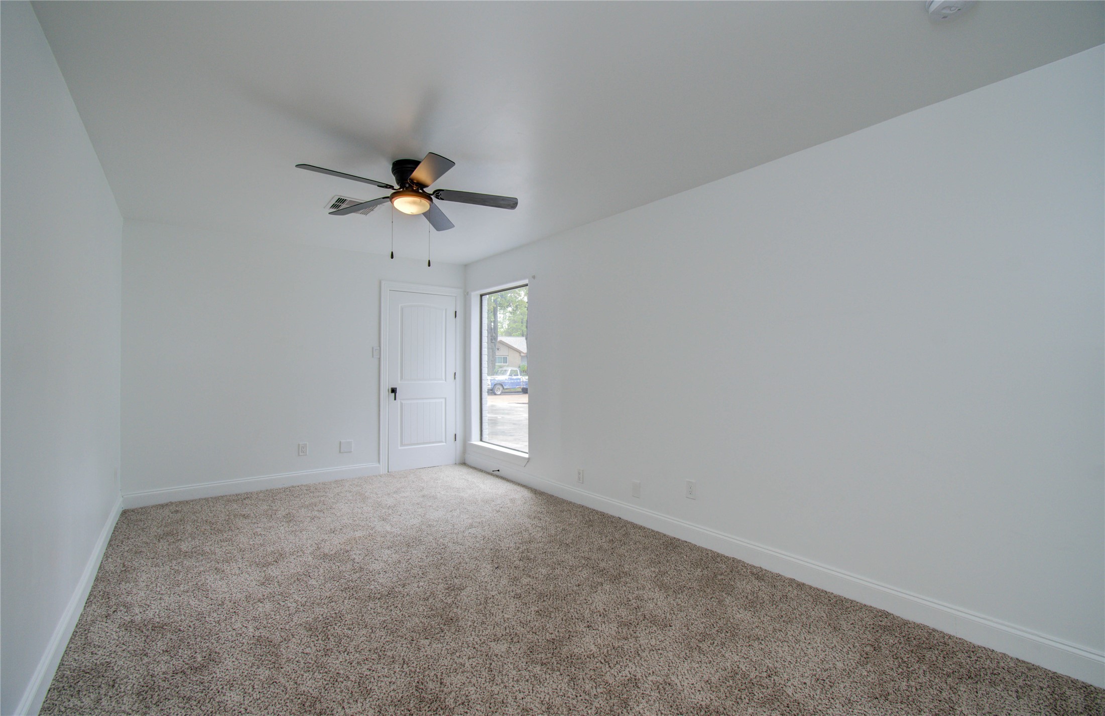 10300 Mayfield Road Houston, TX 77043 - Photo 9 of 32 a view of an empty room with a window
