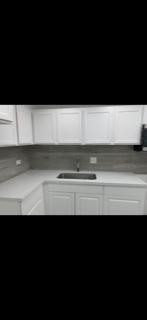 3740 Inverrary Drive, Unit 1A Lauderhill, FL 33319 - Photo 17 of 20 a view of kitchen island with stainless steel appliances