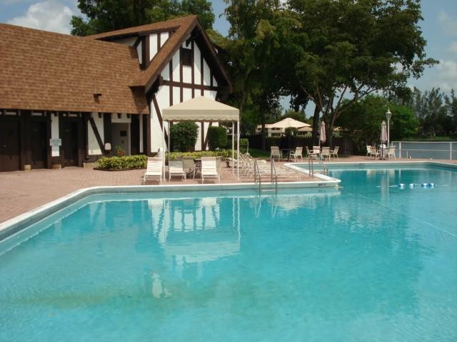 3740 Inverrary Drive, Unit 1A Lauderhill, FL 33319 - Photo 3 of 20 a house view with swimming pool and sitting space