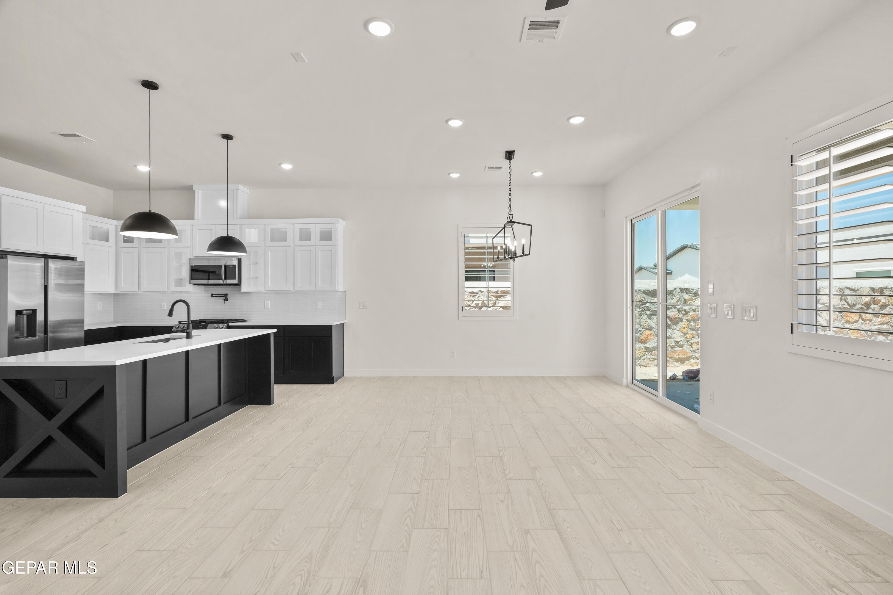 1810 Schyler Love Lane El Paso, TX 79928 - Photo 17 of 37 a large kitchen with a large counter top appliances and cabinets