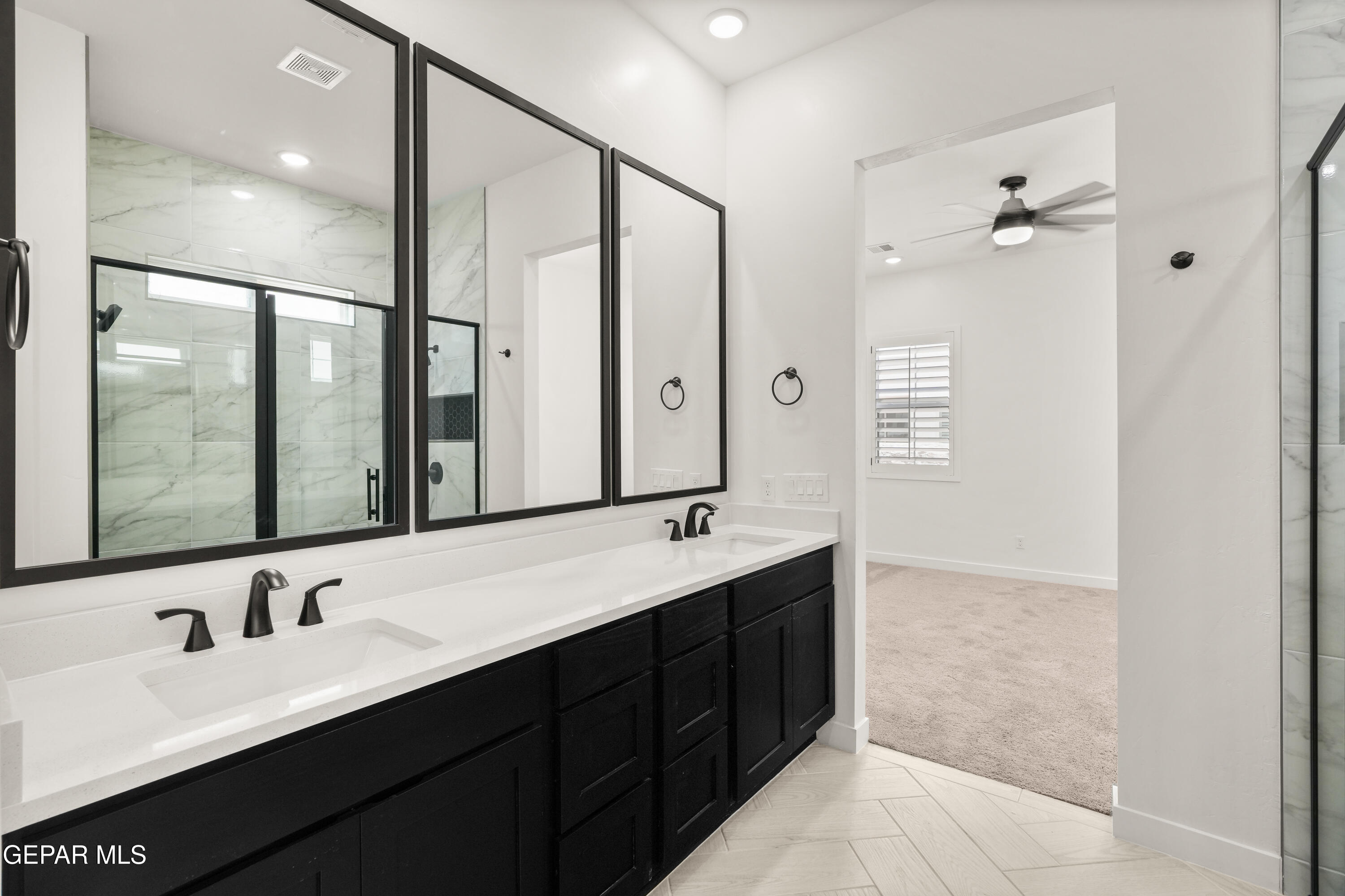 1810 Schyler Love Lane El Paso, TX 79928 - Photo 22 of 37 a bathroom with a double vanity sink mirror double and shower