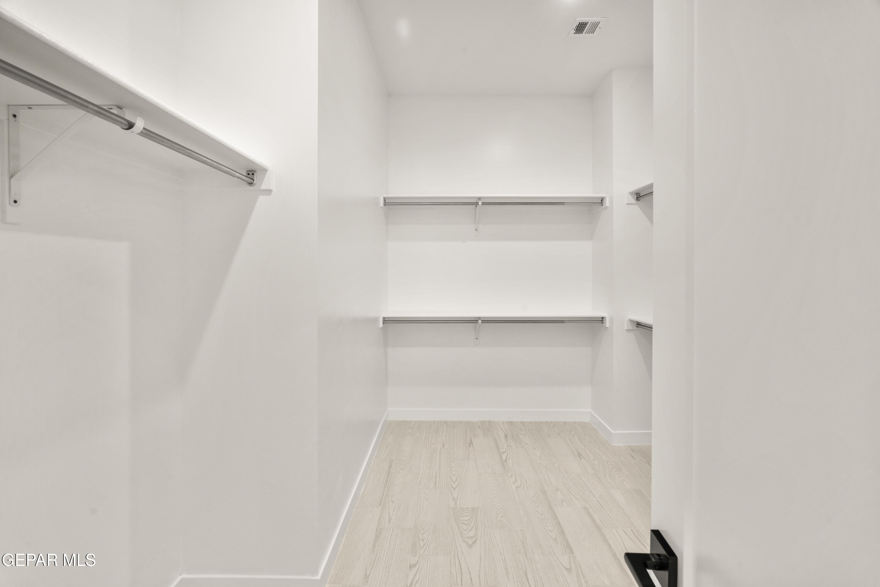 1810 Schyler Love Lane El Paso, TX 79928 - Photo 24 of 37 a view of an empty walk in closet