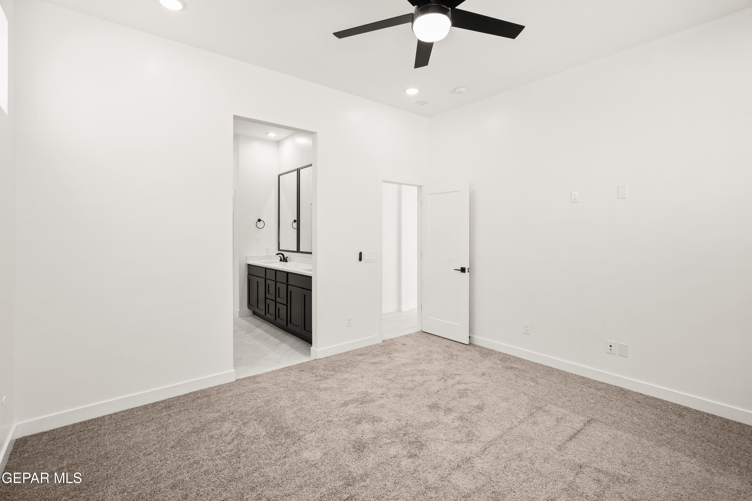 1810 Schyler Love Lane El Paso, TX 79928 - Photo 27 of 37 an empty room with ceiling fan and windows