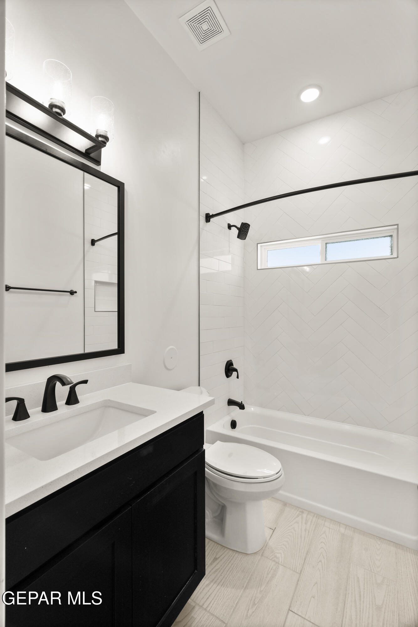1810 Schyler Love Lane El Paso, TX 79928 - Photo 28 of 37 a bathroom with a sink a toilet a mirror and shower