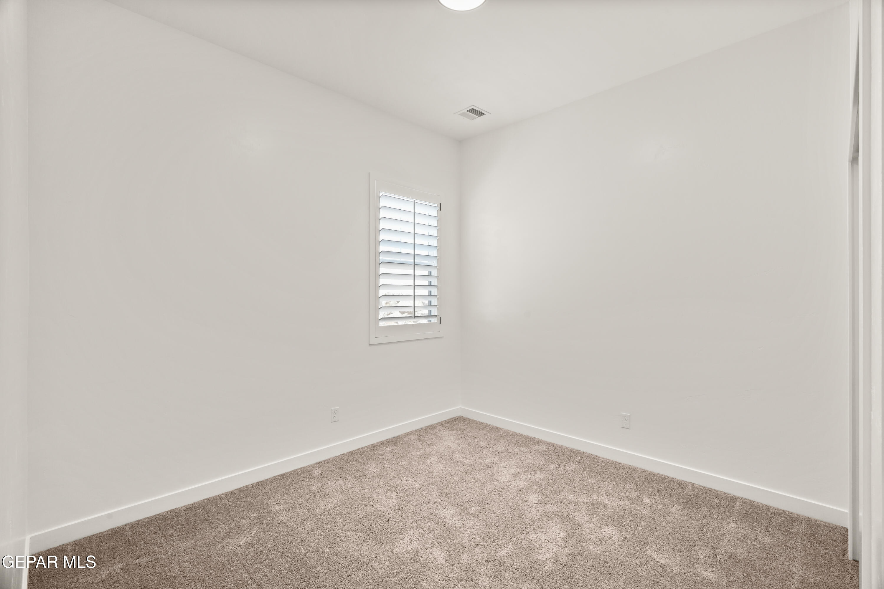 1810 Schyler Love Lane El Paso, TX 79928 - Photo 29 of 37 an empty room with a window