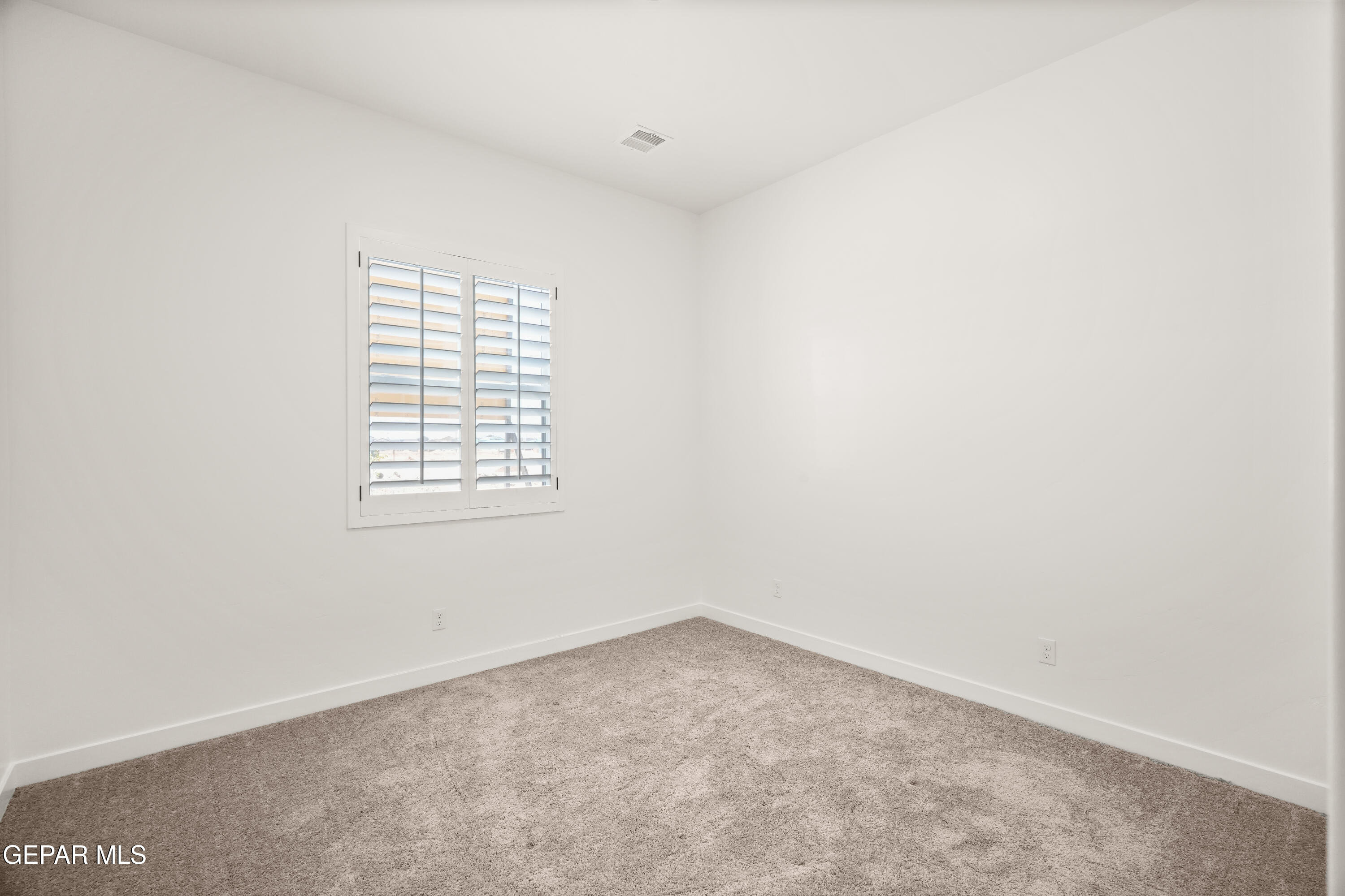 1810 Schyler Love Lane El Paso, TX 79928 - Photo 31 of 37 an empty room with a window