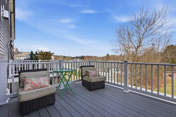 a view of roof deck with patio