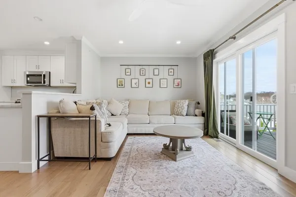 a living room with furniture and a couch