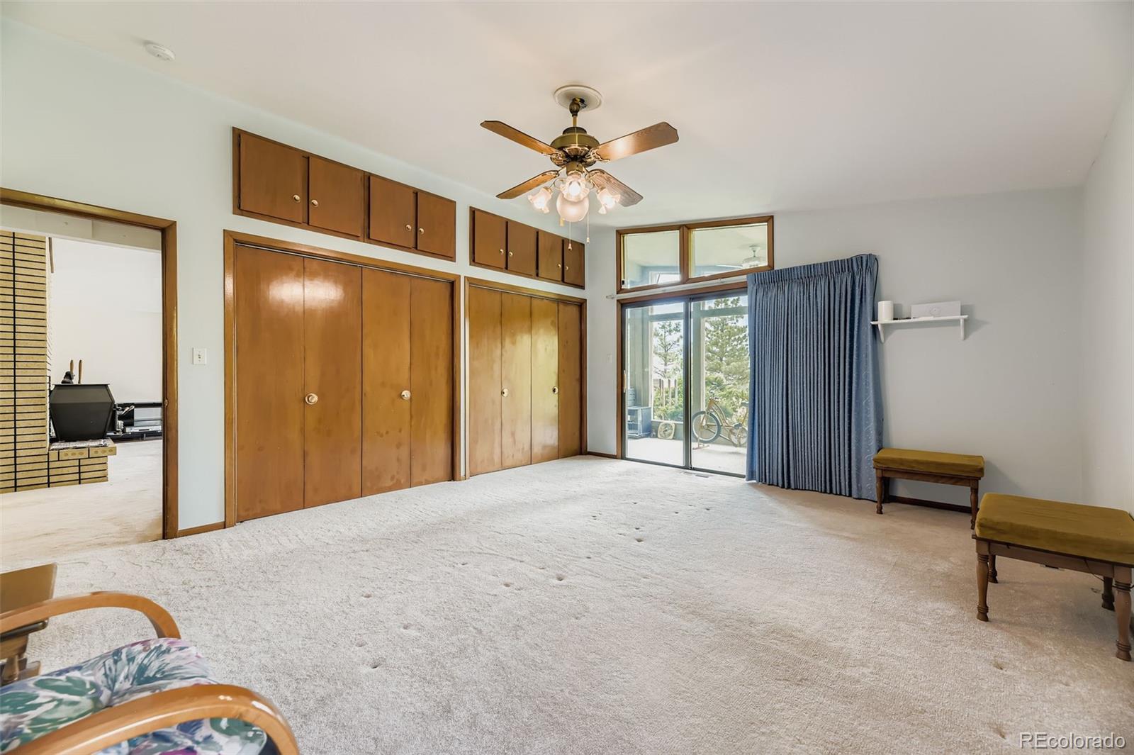 5040 Pine Ridge Road Golden, CO 80403 - Photo 22 of 41 a view of livingroom with furniture and ceiling fan