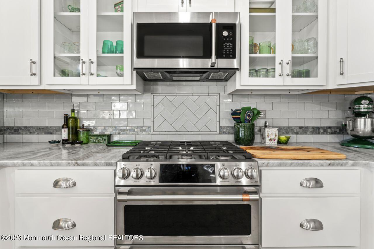 110 Stillwater Road Barnegat, NJ 08005 - Photo 14 of 35 a stove top oven sitting inside of a kitchen