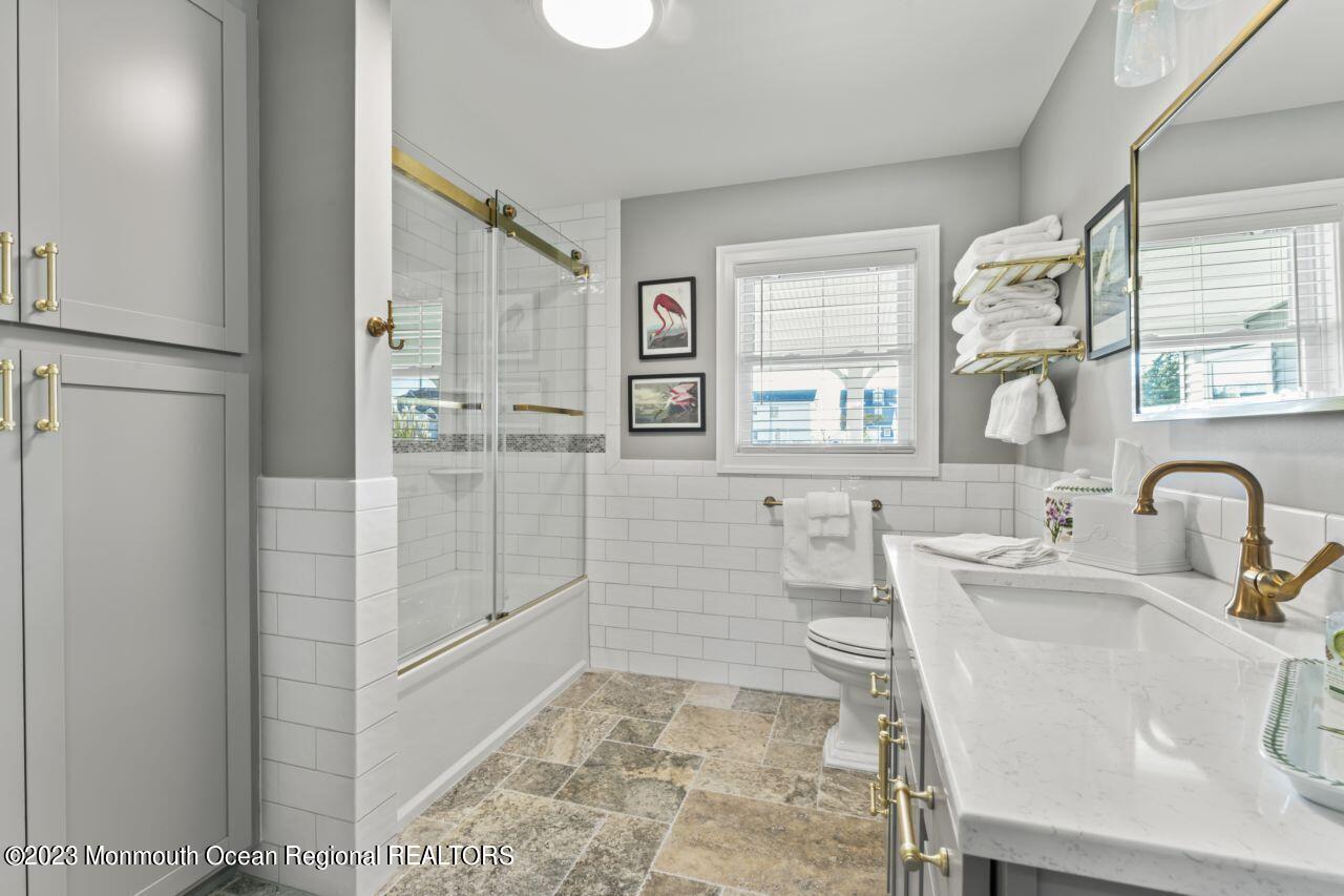 110 Stillwater Road Barnegat, NJ 08005 - Photo 28 of 35 a bathroom with a sink a toilet and shower