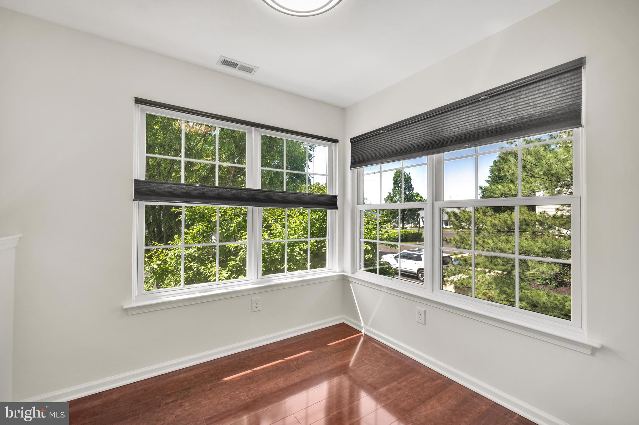 2402 Waterford Road, Unit 94 Yardley, PA 19067 - Photo 10 of 28 a view of an empty room with a window