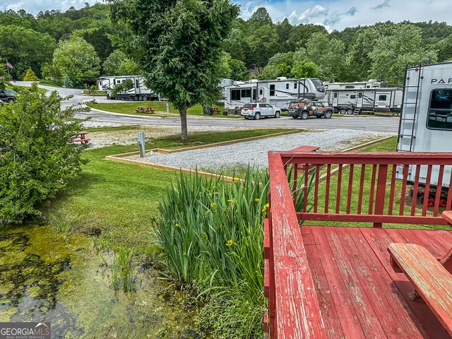 a view of building with outdoor space and sitting area