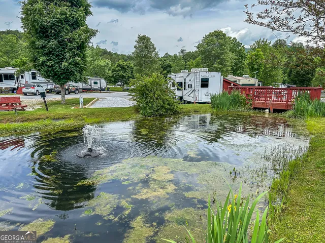 a view of a park with swings and slides