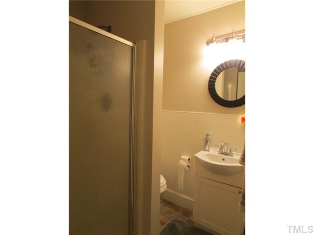 119 Gregory Street Roxboro, NC 27573 - Photo 13 of 21 Master Bath was remodeled with stall shower, new sink vanity, toilet, etc.