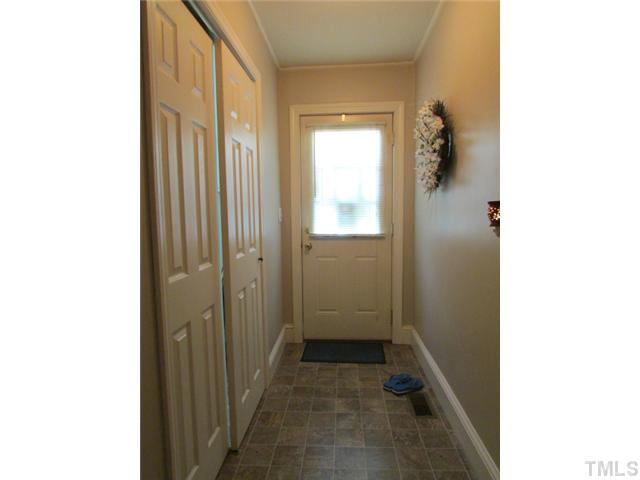 119 Gregory Street Roxboro, NC 27573 - Photo 14 of 21 This hallway leads to laundry room on left and back door