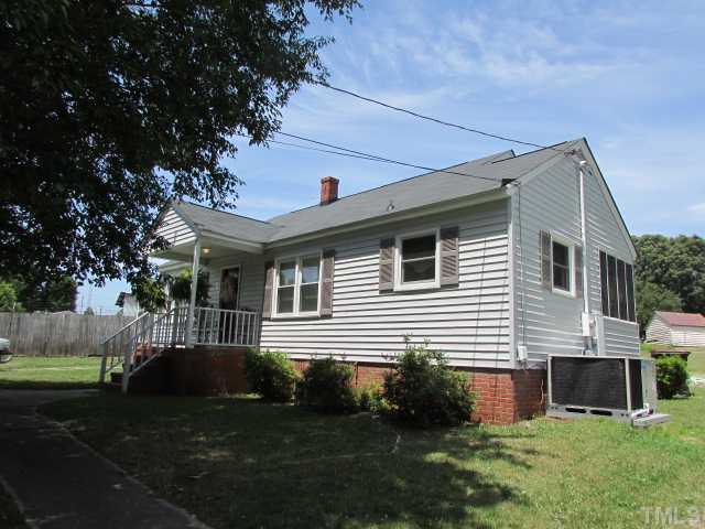 119 Gregory Street Roxboro, NC 27573 - Photo 20 of 21 Side view shows the new heat/ac system installed this year.