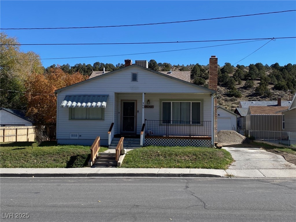 966 Mill Street Ely, NV 89301 - Photo 2 of 14 Bungalow-style house with a porch.