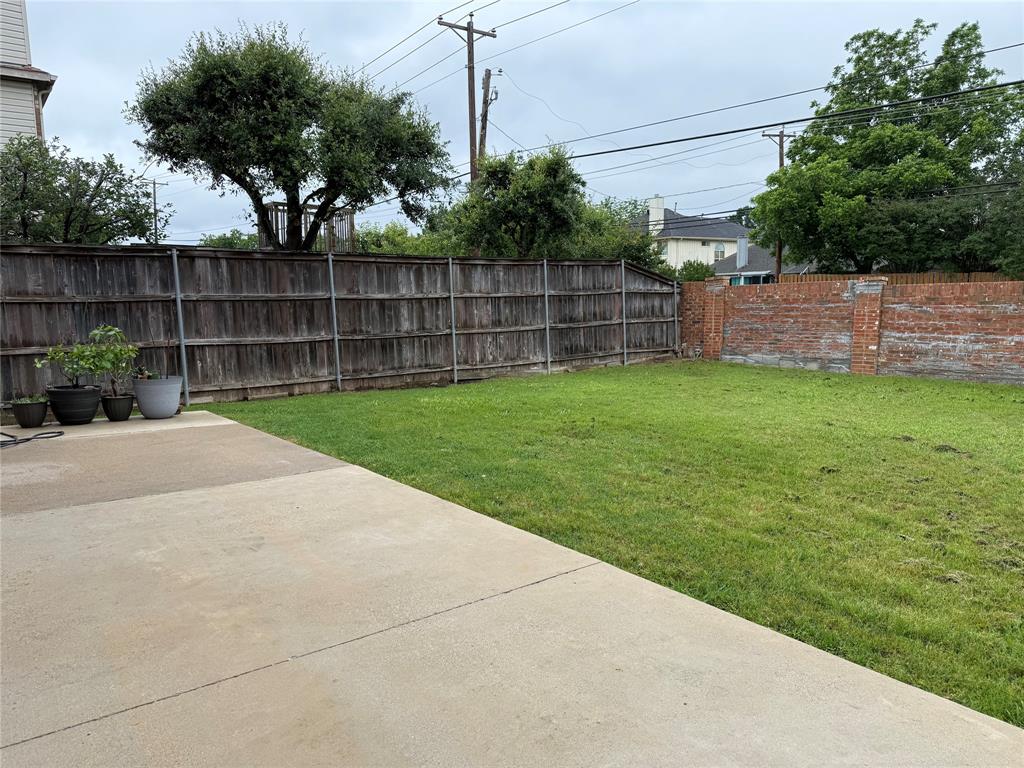 909 Carthage Way Arlington, TX 76017 - Photo 25 of 31 Fenced by brick and wood allows privacy for all