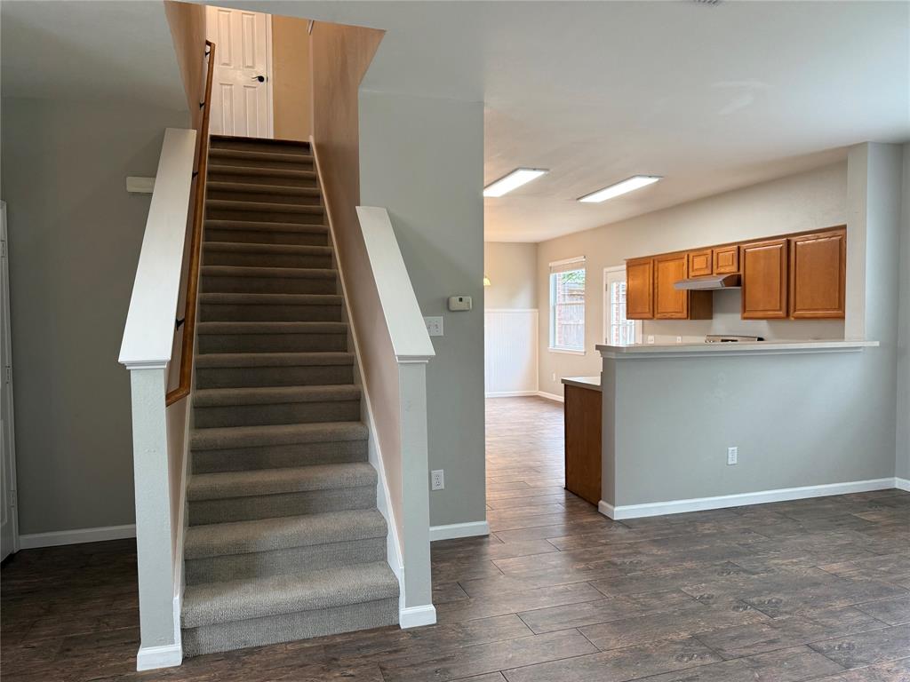 909 Carthage Way Arlington, TX 76017 - Photo 9 of 31 Newly carpeted stairs are just one of the updates