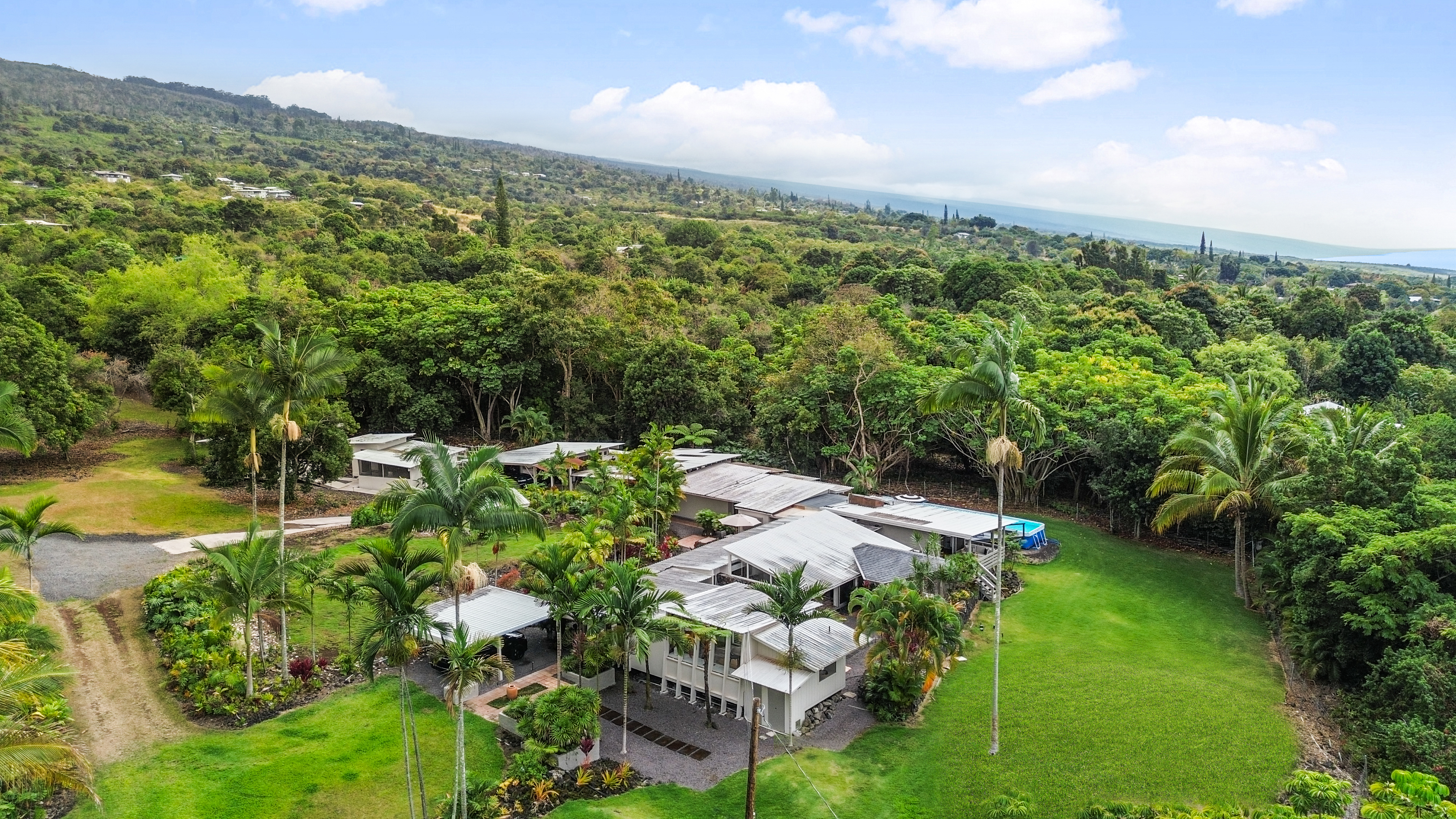 83-5369 Manako Road Captain Cook, HI 96704 - Photo 1 of 30 a view of a lake with a yard