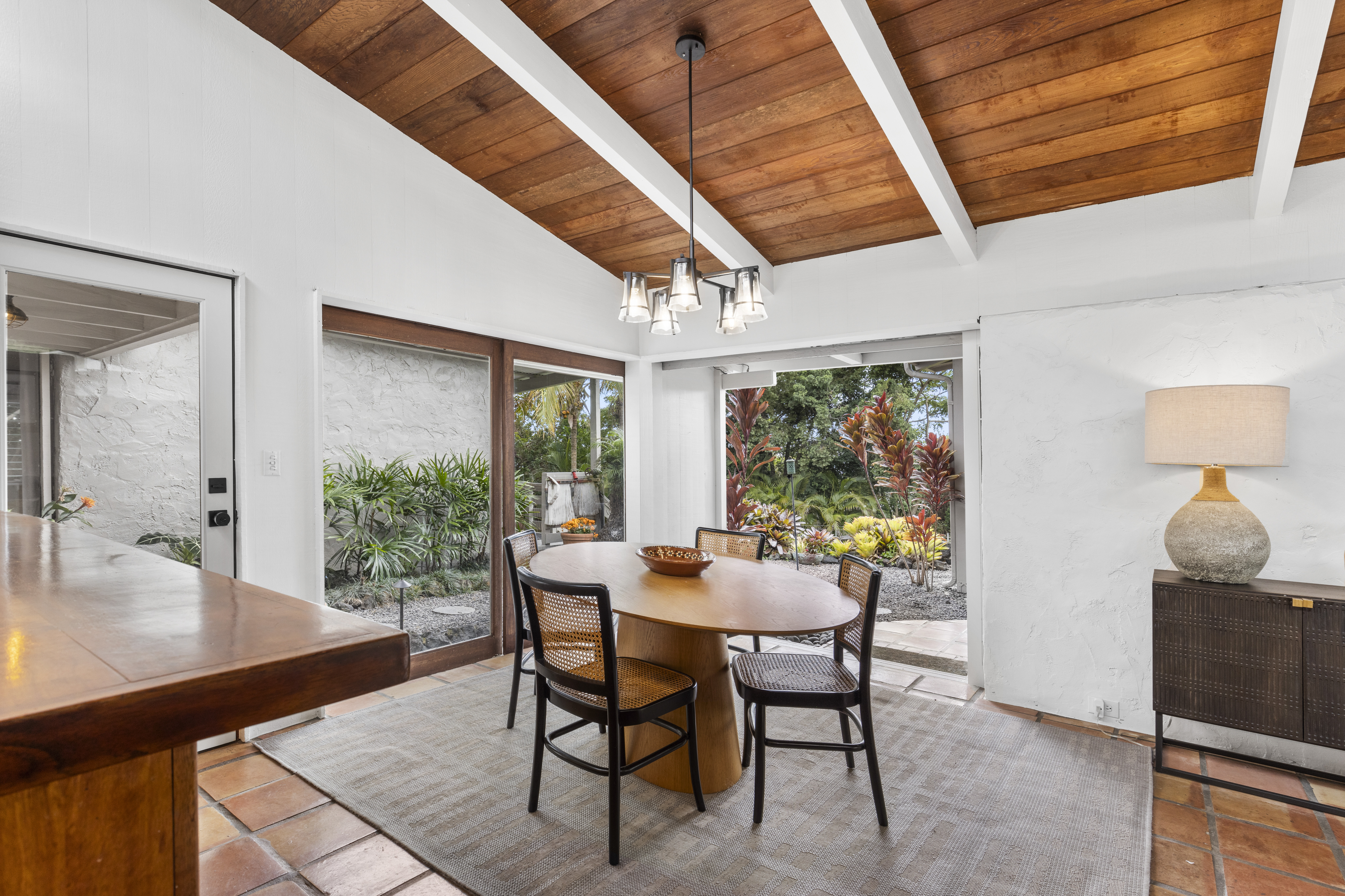 83-5369 Manako Road Captain Cook, HI 96704 - Photo 11 of 30 a dining room with furniture and window