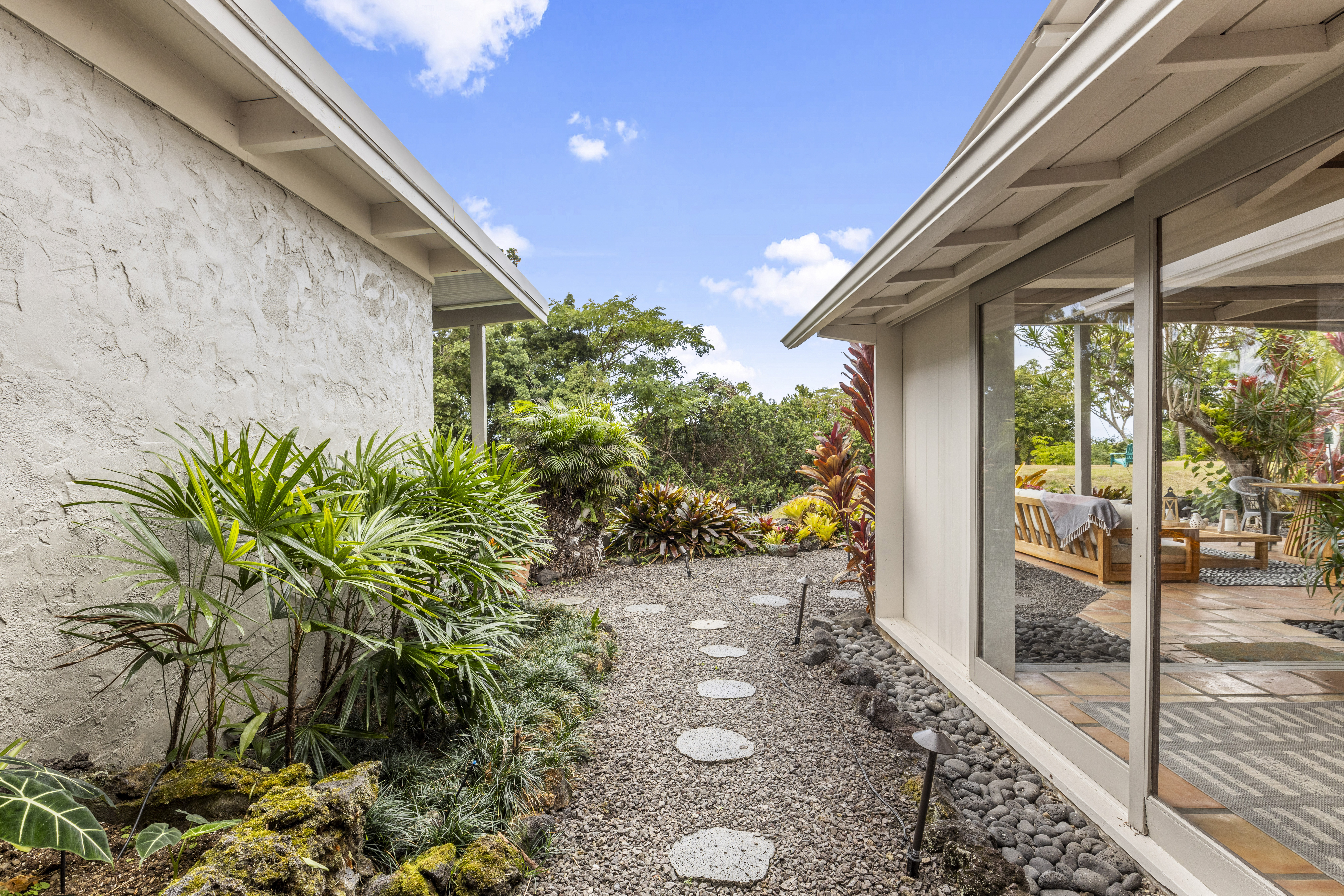 83-5369 Manako Road Captain Cook, HI 96704 - Photo 14 of 30 a view of a backyard with garden